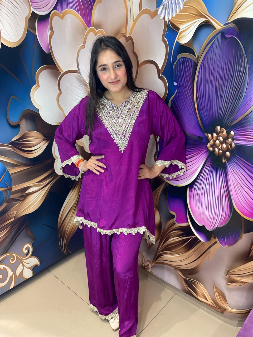 PURPLE WITH GOLD LACE WORK ON IT WITH LOOSE PANTS